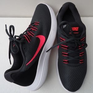 SIZE 11. Nike women's Lunar Converge running shoe.